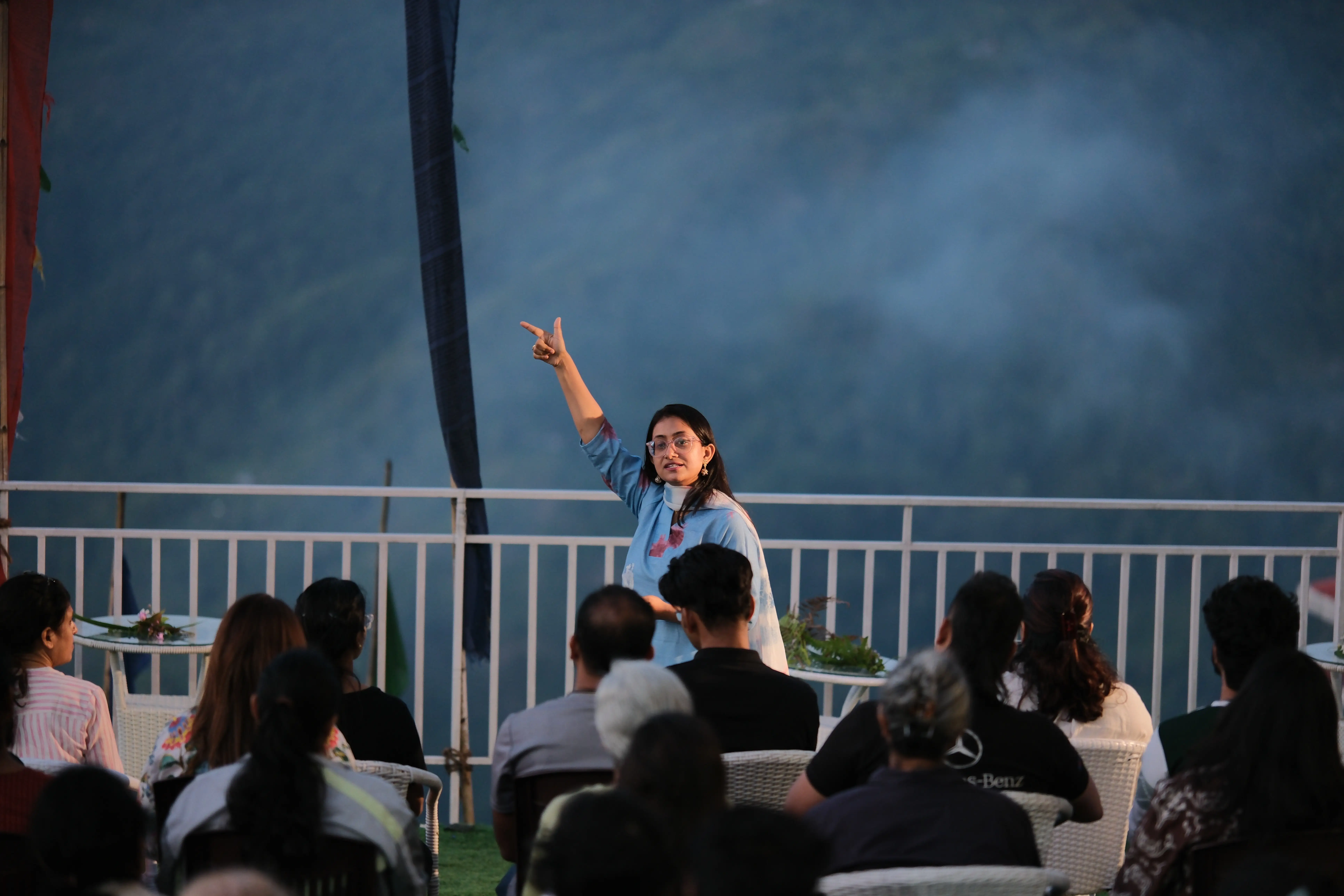 Instructor on stage at a seminar
